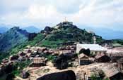 View to local villages from holy stupa at Kyaiktiyo. Myanmar (Burma).