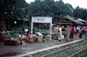 Railway station. People waits for train. They want to sell their products to traders at train. Area around Kalaw village. Myanmar (Burma).
