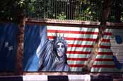 Political propaganda at walls of old US emabassy. Tehran. Iran.