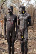 Mursi men. South,  Ethiopia.