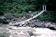 Crossing Baliem river using goverment bridge near Wamerek village. Indonesia.