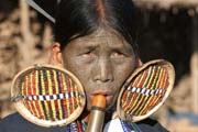 Woman from Makan Chin tribe, Mindat village, Chin State. Women decorate their faces traditionaly by tattoo. Different tribes use different tattoo ornaments. Myanmar (Burma).