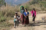 Village people an the way to larger village Mindat. Chin State. Myanmar (Burma).