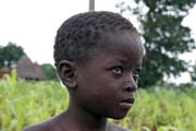 Boy from Somba tribe (also called Betamarib people). Face is decorated by traditional scars. Boukoumb area. Benin.